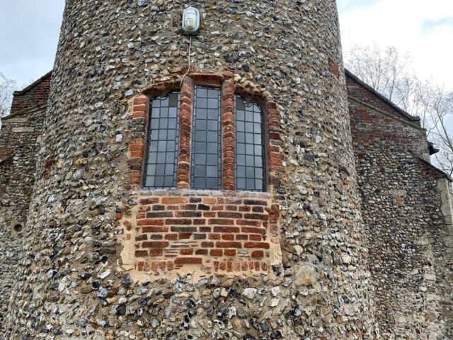 Repairs to the Tudor window at Hemblington church complete. Removal of cement mortar and releading the glass, missing bricks replaced after being cut to shape and replasrering. #brick #tudoraechitecture #flint #norfolk